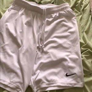 White Nike shorts